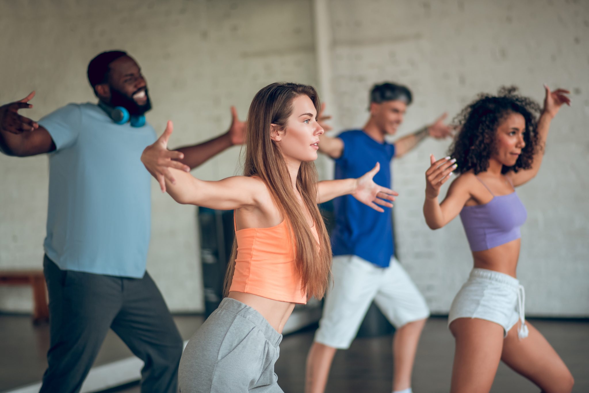 group of people learning to dance jazz funk